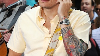 John Mayer Denies He's Reunited With Jennifer Aniston, Bashes HuffPo